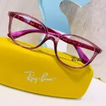 lunettes de vue fille 7 ans Ray Ban rose translucide