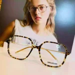lunettes de vue femme grande forme plastique écaille foncée et claire branches fines dorées
